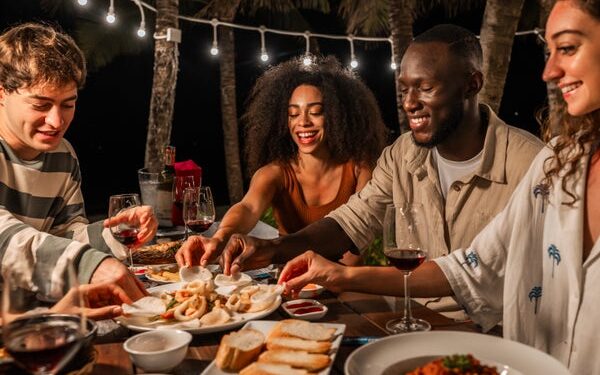 Friends dining outdoors