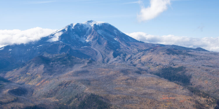 a mountain landscape under blue sky