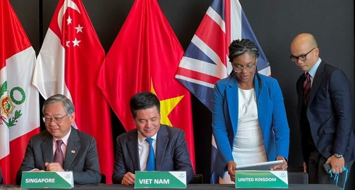 Singapore and Vietnam trade ministers alongside UK Conservative leader Kemi Badenoch during the signing of the deal for the UK to join the CPTPP in New Zealand last year