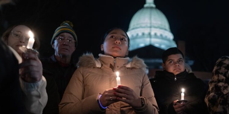 A vigil on the grounds of the Wisconsin State Capital on Tuesday to mourn the victims of the shooting at Abundant Life Christian School in Madison.