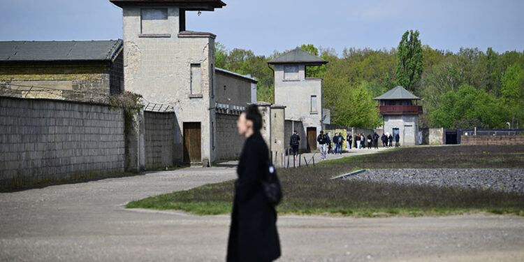 Former Nazi camp guard, now 100, can face trial, German court rules