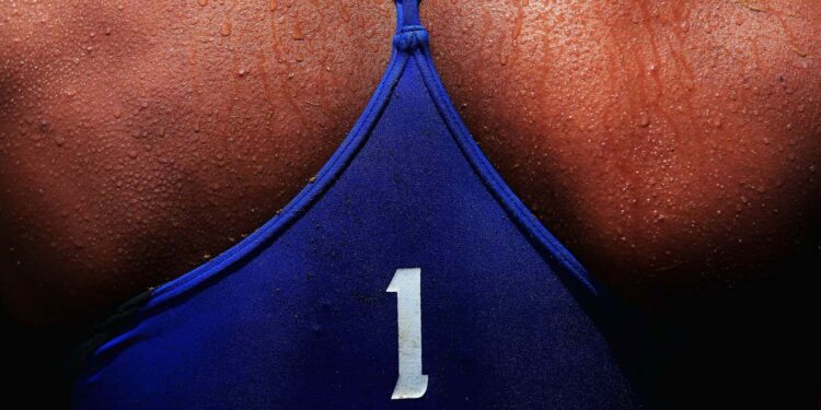 Sweat is seen on the back of Varapatsorn Radarong of Thailand during her Beach Volleyball Women's Gold Medal match at the 3rd Asian Beach Games in Haiyang, China in 2012 (Photo by Ryan Pierse/Getty Images)