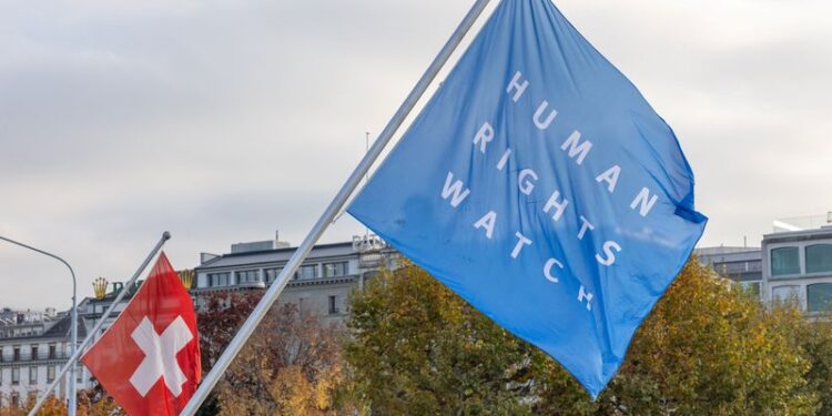 © Reuters. FILE PHOTO: A Human Rights Watch flag is pictured on the Mont-Blanc bridge in Geneva, Switzerland, November 7, 2024. REUTERS/Denis Balibouse/File Photo