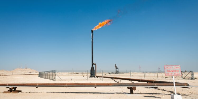 A burning flare stack at an oil and gas field in the nation of Bahrain. The Export Import Bank of the United States, or EXIM, has granted export credit assistance to oil projects in the country, cutting against Biden administration policy.