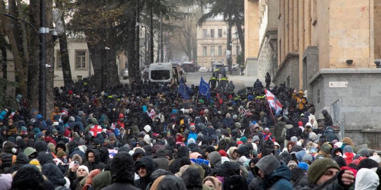 Protests in Georgia continue as ex-footballer becomes president