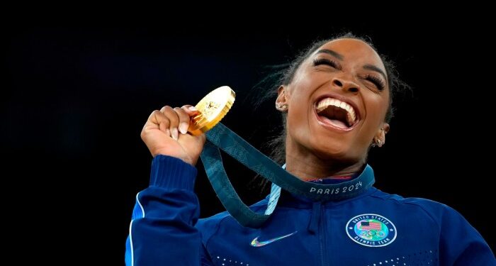 US gymnast Simone Biles celebrates after winning the gold medal