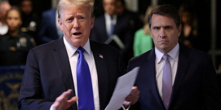 © Reuters. FILE PHOTO: Former U.S. President Donald Trump, alongside his attorney Todd Blanche, speaks to the media as he arrives for his criminal trial for allegedly covering up hush money payments at Manhattan Criminal Court on May 30, 2024 in New York City. Michael M. Santiago/Pool via REUTERS/File Photo