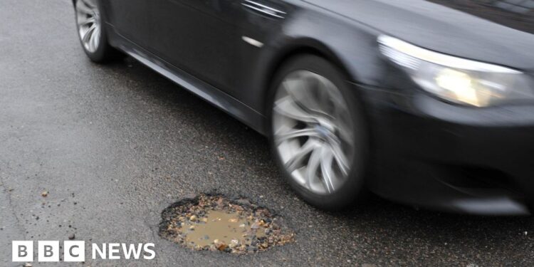 Local authorities given extra £500m to fix potholes