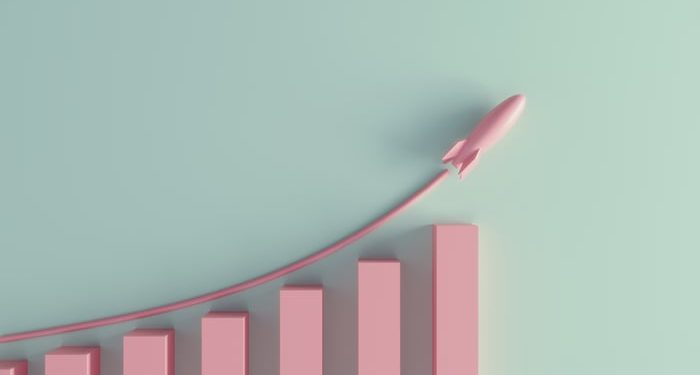 A rocket ship soaring over a growing bar graph.